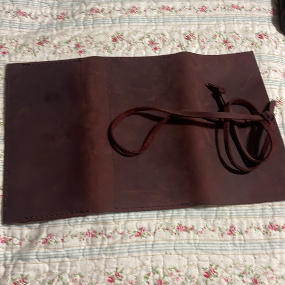 Local artist leather checkbook wallet with three credit card slits. 100% leather